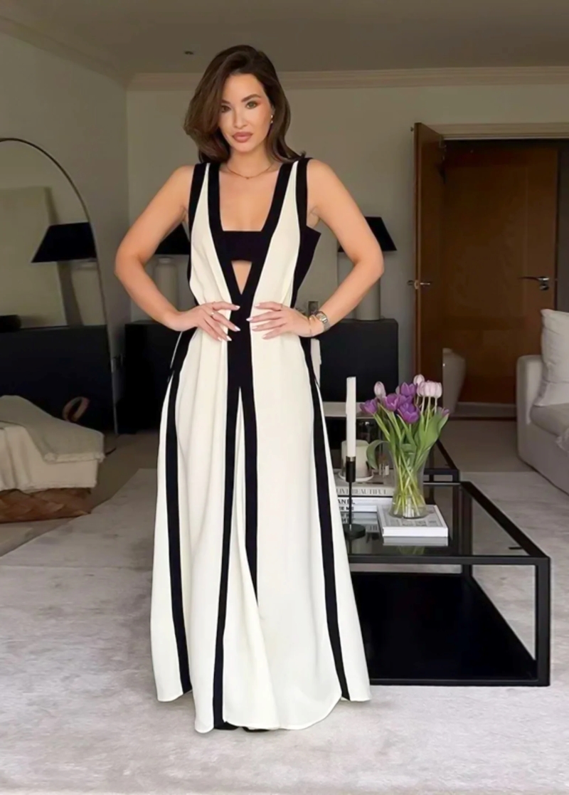 woman wearing black and white maxi dress