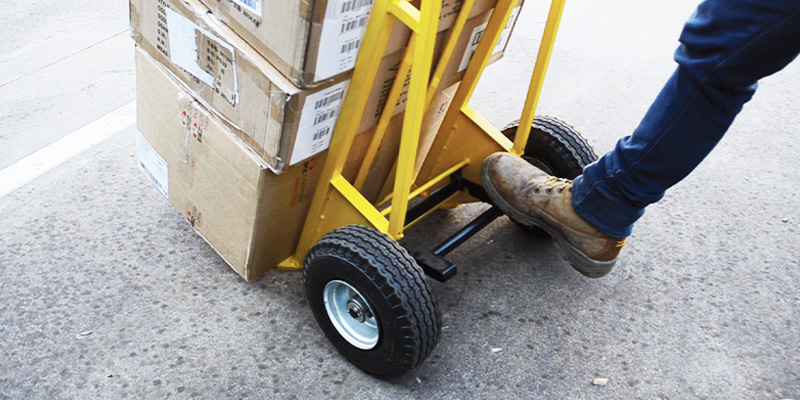 person using warehouse trolley