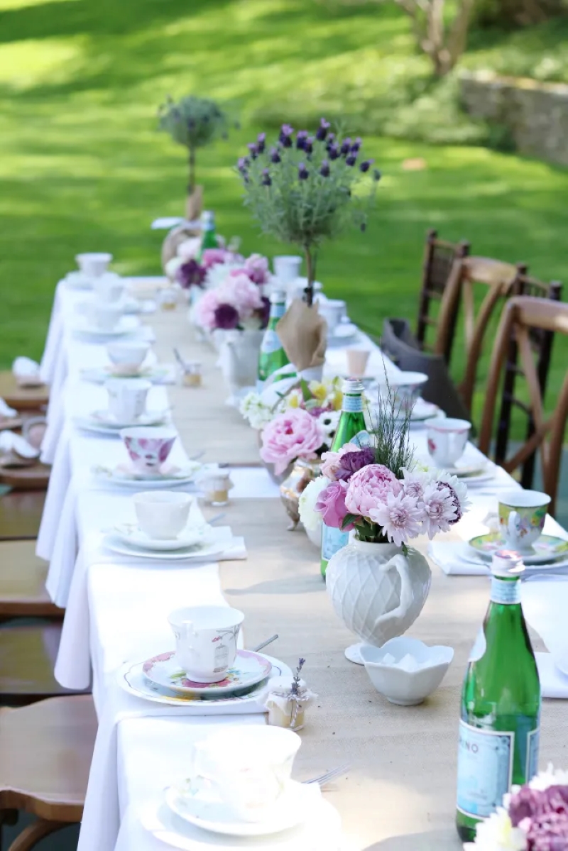decoration for tea party with tea cup sets, flowers